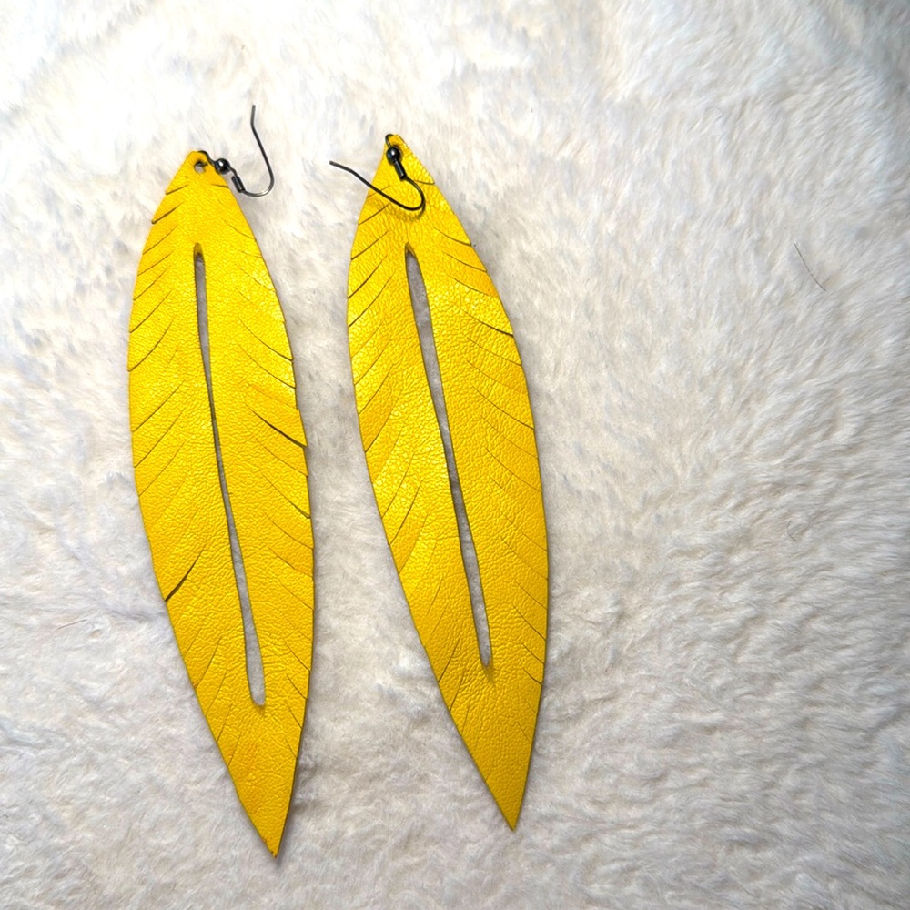 Yellow leather earrings.